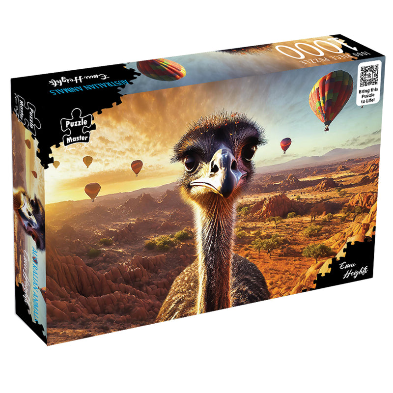 Load image into Gallery viewer, Puzzle Master 1000-piece jigsaw puzzle box titled Emu Heights featuring a close-up emu and hot air balloons over a desert landscape.
