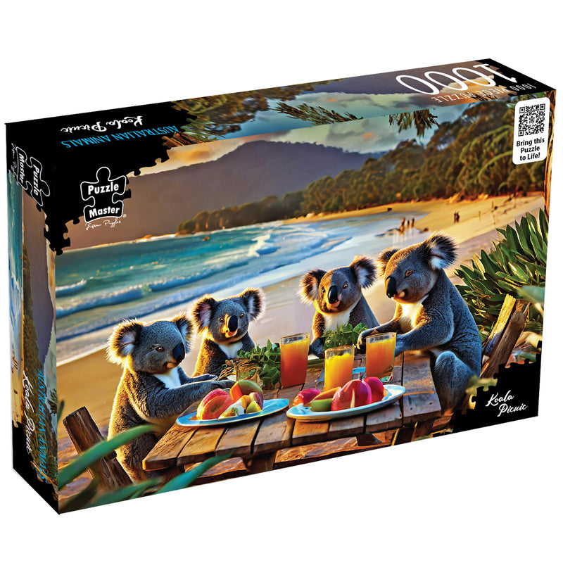 Load image into Gallery viewer, Puzzle Master 1000 piece jigsaw puzzle box titled Koala Picnic featuring four koalas dining at a beach picnic table.
